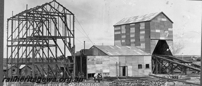 P16845
Commonwealth Railways (CR) - TAR line Naretha Quarry buildings under construction. C1916
