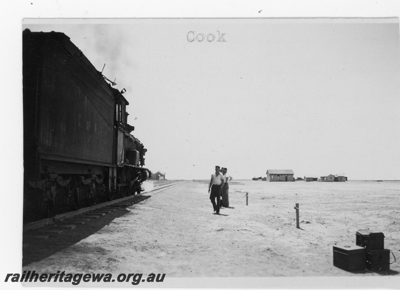 P16866
Commonwealth Railways (CR) - TAR line G class steam locomotive at Cook. Photo taken looking along the side of the locomotive. 
