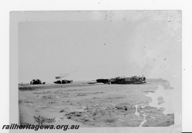 P16876
Commonwealth Railways (CR) - TAR line engine shed and yards at Cook. 
