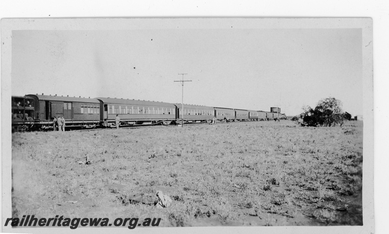 P16877
Commonwealth Railways (CR) - TAR line Transcontinental express at an unknown location. Rear view of train taken from brakevan. 
