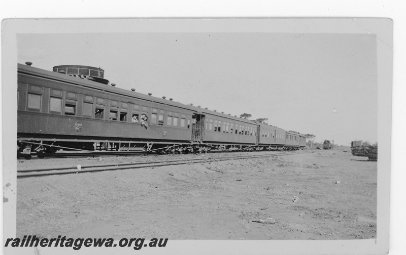 P16880
WAGR ARS class and AZ class coaches as part of Kalgoorlie passenger train consist at an Unknown location. EGR line
