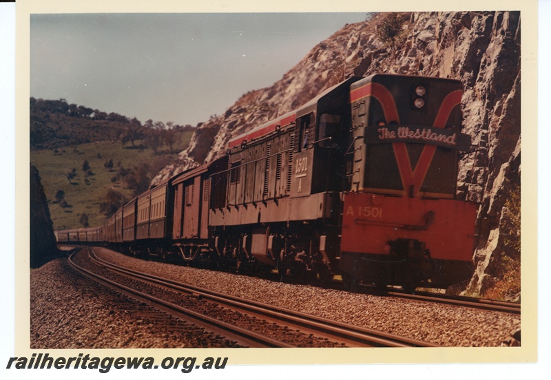 P16948
A class 1501 diesel loco in the green with red stripe livery heading the  