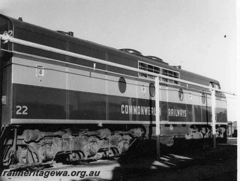 P16966
Commonwealth Railways (CR) GM12 class 22, in maroon and silver livery, rear and side view
