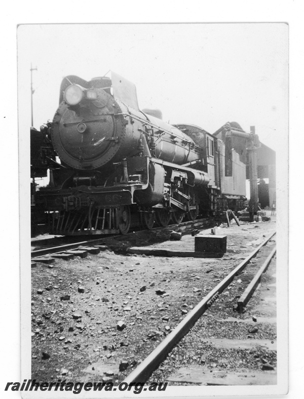 P16968
Commonwealth Railways (CR) C class 66, water column, shed, front and side view
