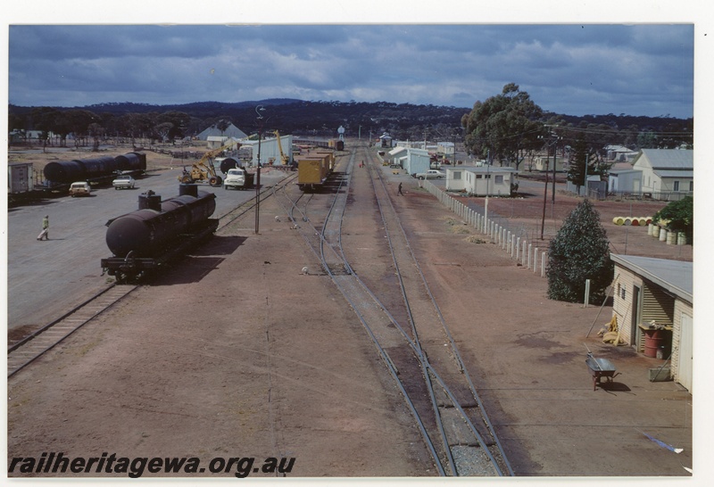 P16976
Station yard, sidings, points, wagons, goods shed, signals, trackside buildings, station building, Norseman, looking south, CE line, overview
