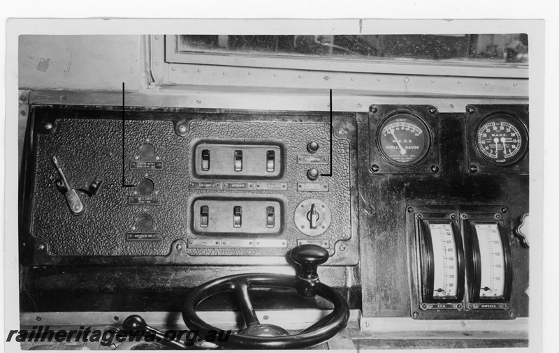 P16993
Driver's controls, X class loco, wheel is power controller, interior view of loco cab
