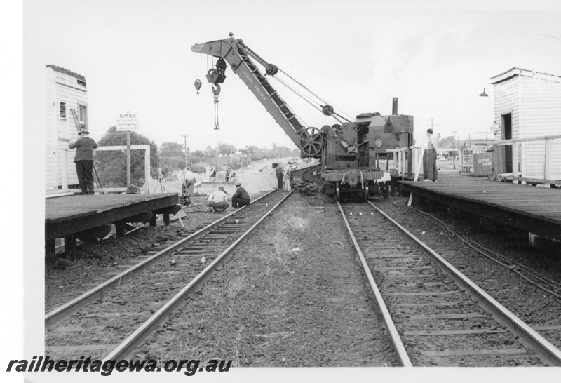 P17017
Cowans Sheldon 60 ton Breakdown Crane No 31, removal of old subway, tracks, station buildings, West Midland, ER line.
