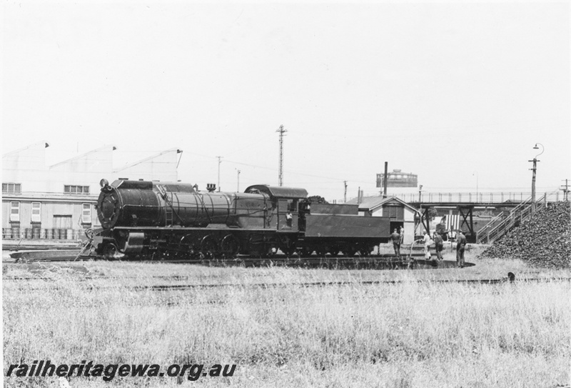 P17046
S class 549 Greenmount on the turntable at East Perth Loco with manual power in operation. Footbridge in the background and top portion of gasometer in background.

