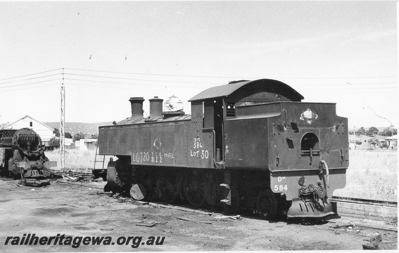 P17062
DM class 584 steam locomotive on the scrap road, side and bunker view, Midland workshops.
