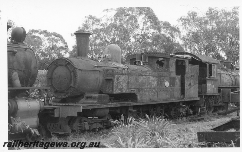 P17063
N class 201 steam locomotive on the scrap road, front and side view, Midland workshops.
