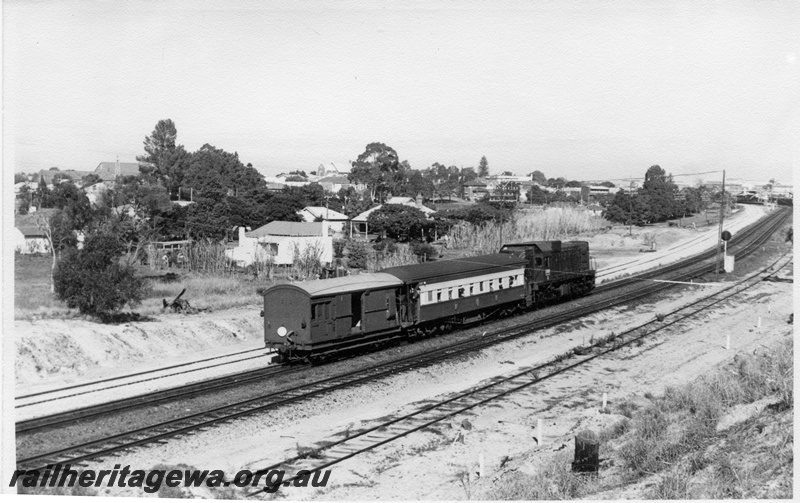 P17108
A class 1509, hauling AQZ carriage 418 and ZB van, from No 20 Goods, moving away from camera, ER line
