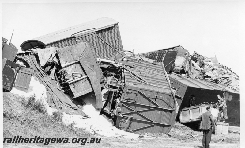 P17121
Aftermath of smash, overturned and damaged goods vans, Booraan, EGR line
