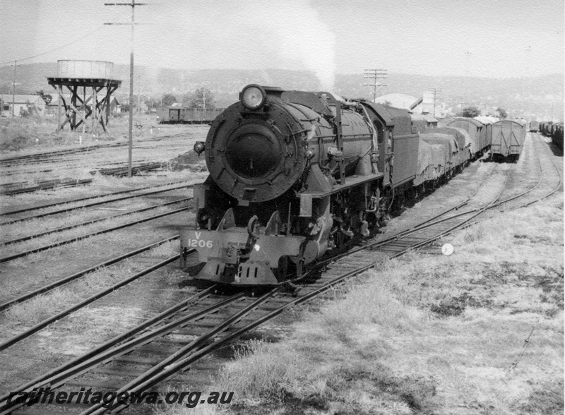 P17190
V class 1206, on up goods train No 12, water tower, sidings, Midland, ER line

