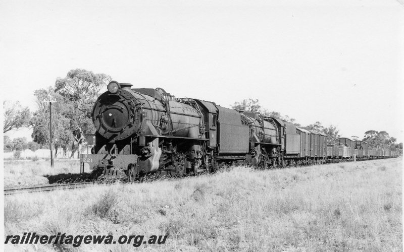 P17245
V class 1221 double heading with V class 1210 steam locomotives, on goods train, front and side view, between Yornaning and Popanyinning, GSR line.
