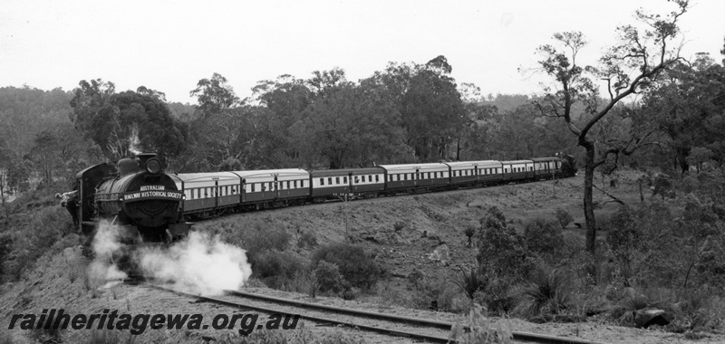 P17255
W class 943 steam locomotive on ARHS tour train with banking engine at the rear on Dwellingup tour, side view of the consist.
