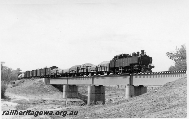 P17293
DD class 592 steam locomotive , steel girder bridge with concrete pylons,  goods train crossing the Preston River  bridge, side and front view, SWR line.
