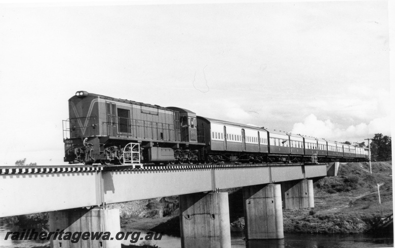 P17295
RA class 1908 diesel locomotive, front and side view, on the Australind, crossing Roelands bridge, SWR line.
