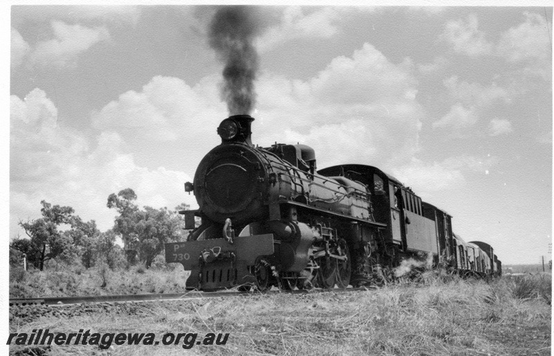 P17317
PMR class 730 steam locomotive on 11 Goods near Swan View. ER line. Low level view of front & side of locomotive.
