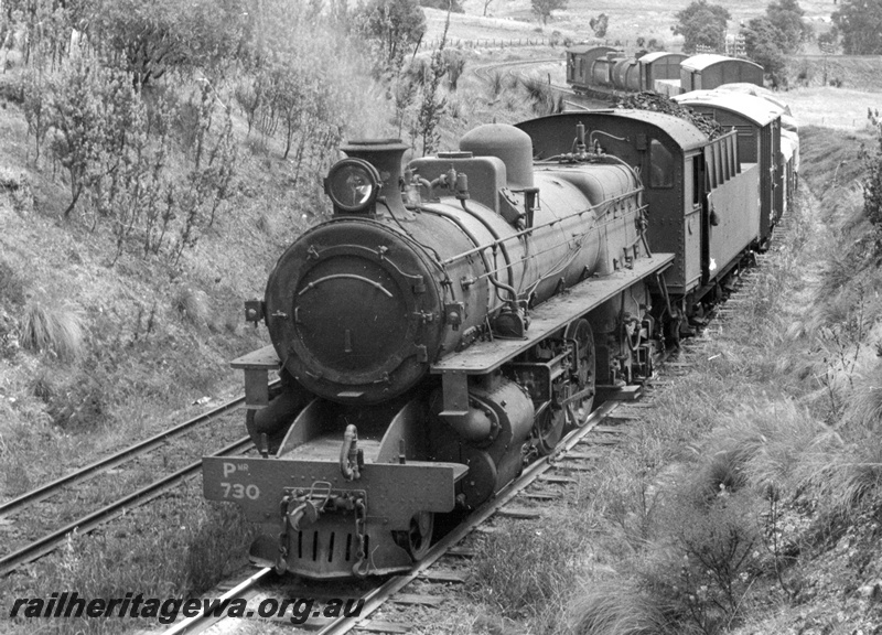 P17318
PMR class 730 steam locomotive on 11 Goods east of Swan View. ER line. Front & side view of locomotive.
