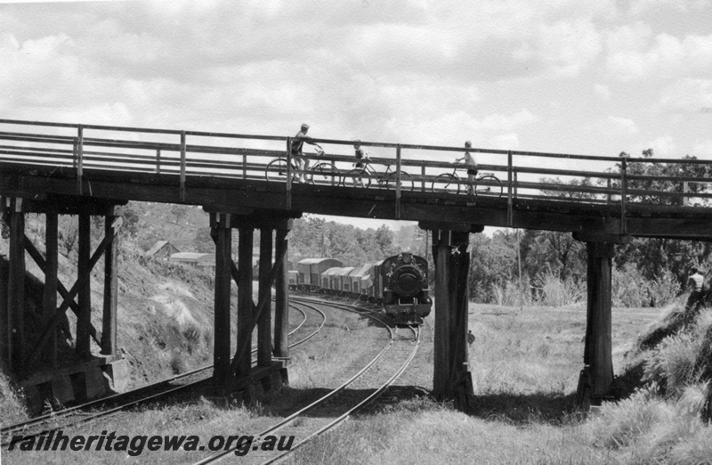 P17320
PMR class 730 steam locomotive on 11 Goods leaving Swan View. ER line. Morrison Road overbridge in foreground with 3 boys, and bicycles, on the bridge.
