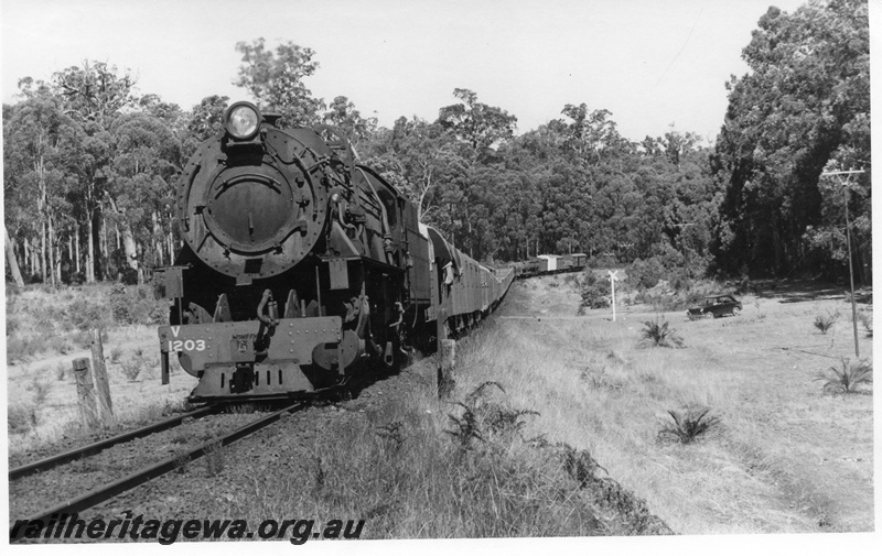 P17332
V class 1203 steam locomotive on goods train, front view, between Moorhead and Hamilton River bridge, BN line.
