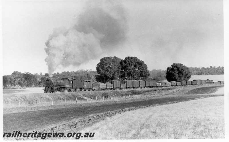 P17363
S class steam locomotive, on goods train, front and side view, BN line. 
