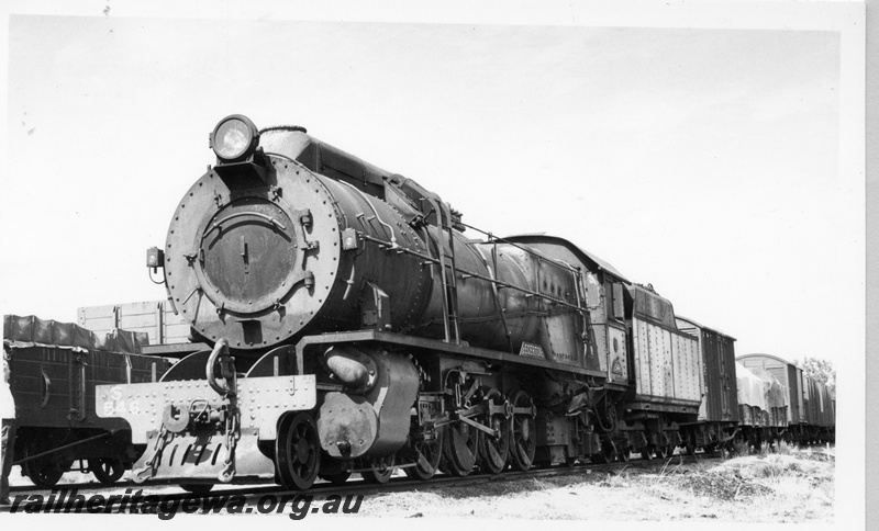 P17402
S class 546, on No 103 goods train, crossing No 104 goods train, Hillman, BN line, front and side view
