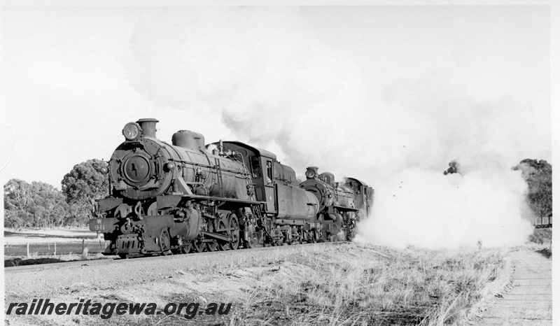 P17414
W class 911, PMR class 721, double heading No 104 goods train, BN line, front and side view
