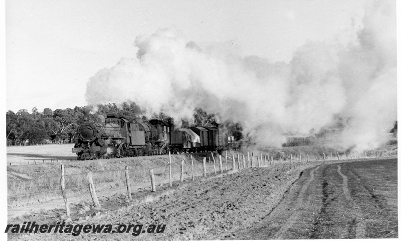 P17418
PMR class 727, S class 546, double heading No 104 goods train, BN line ploughed field in foreground, 
