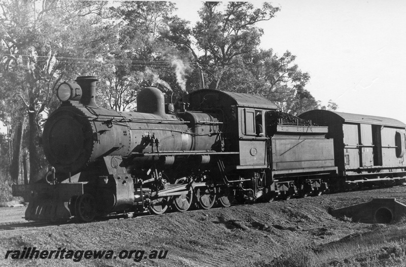 P17458
FS Class 452 steam locomotive hauling a Z Class brakevan on a ballast train at Brookhampton. Side view of locomotive and tender. PP line.
