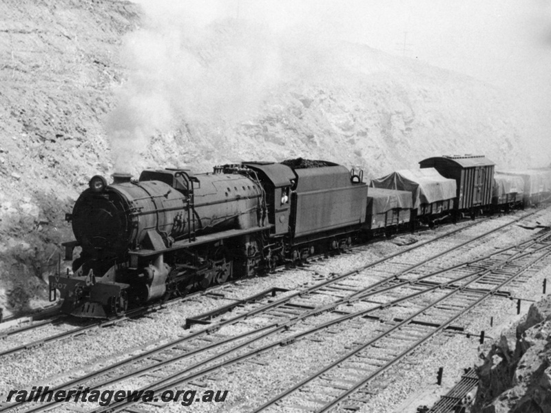 P17499
V class 1207 on a goods train in a cutting departing Avon Yard 
