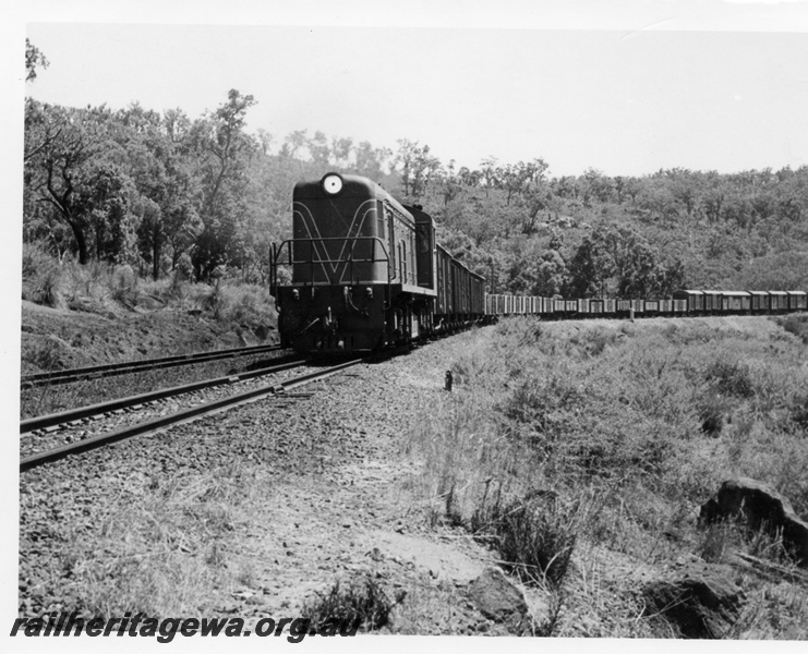 P17604
C class 1701 diesel locomotive hauling a goods train near National Park. ER line. This would possibly have been one of the last trains to travel this section of line.
