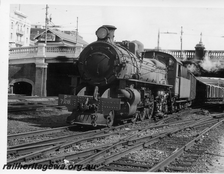 P17647
PMR class 728 steam locomotive at the head of a goods train travelling through City Station. ER line. Barrack Street bridge overhead and signal box visible above bridge.
