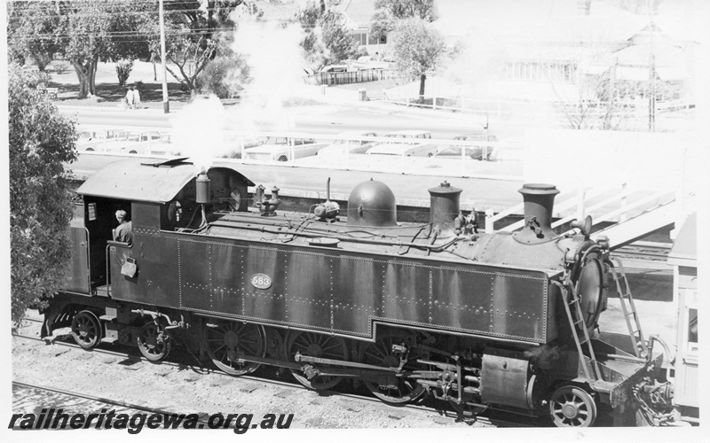 P17678
DM class 583, water bag hanging near cab, carpark, Claremont station, ER line, side and front view from elevated position
