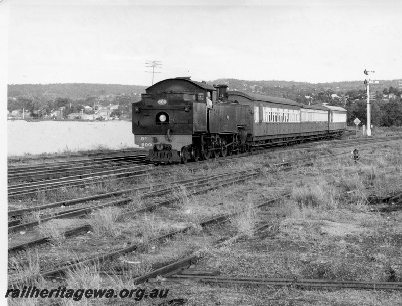 P17695
DD class 600, bunker first, on passenger train, bracket signal, Bellevue, ER line, last up service 5:56 pm 
