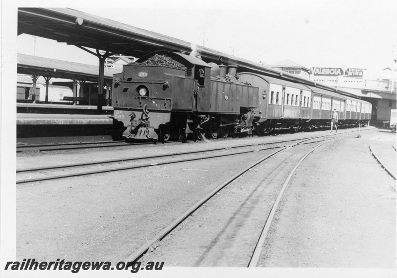 P17704
DD class 599, bunker first, on 4 pm Perth to Fremantle passenger train, Perth station, ER line
