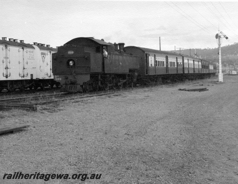 P17714
DD class 599, bunker first, on suburban passenger train, signal, ER line, c1965
