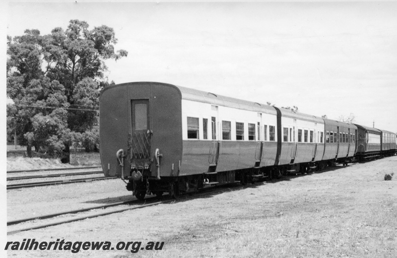 P17719
AJ class express brakevans, AKB class 60 first class suburban brake carriage, end and side view, Armadale, SWR line.
