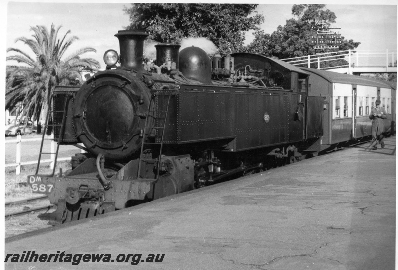 P17722
2 of 2, DM class 587 steam locomotive on suburban passenger working, front and side view, footbridge, platform, Midland, ER line.
