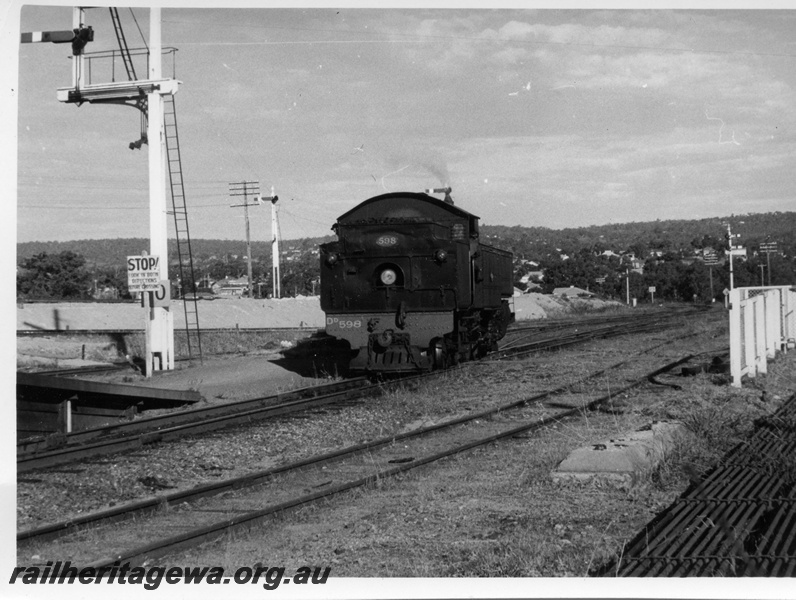 P17726
DD class 598 steam locomotive running light engine, end and side view, signals, signal rodding, relay boxes.
