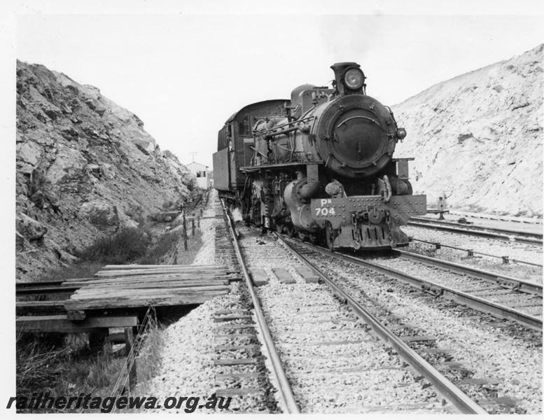 P17731
PM class 704 steam locomotive travelling light engine at the eastern end of Avon Yard. Front view of locomotive. GSR line.
