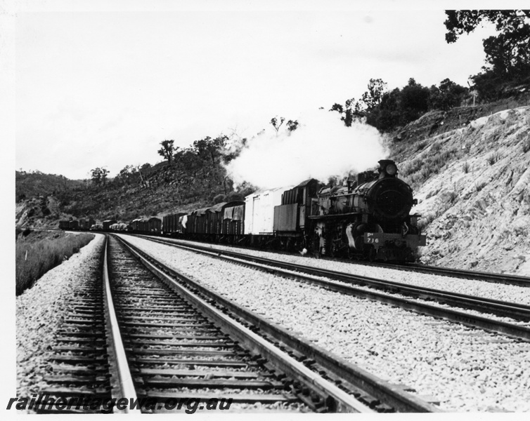 P17734
PM class 716 steam locomotive working 24 goods train from York to Forrestfield passing through Jumperkine crossing loop in the Avon Valley. The middle set of tracks is the passing loop. ER line.
