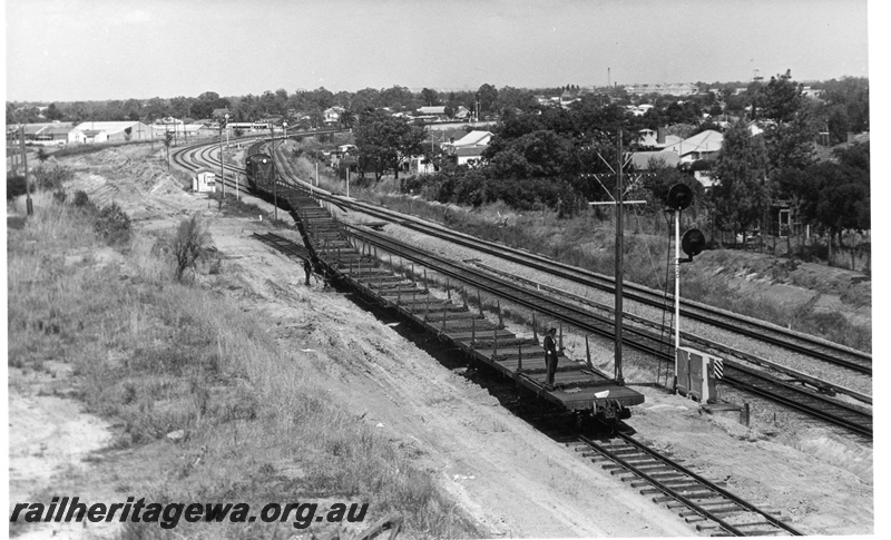 P17745
1 of 9 Rail reclamation on old ER line. C class 1701, long hood leading, on empty reclamation train, coming onto the old Eastern line, light signal, Bellevue, ER line
