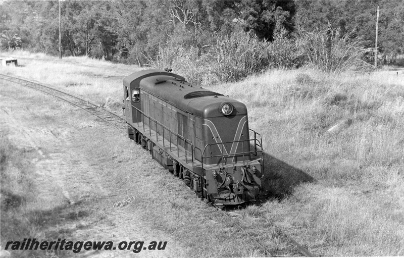 P17752
8 of 9 Rail reclamation on old ER line. C class 1701, running light, on reclamation duties, Swan View, ER line, side and front view from elevated position
