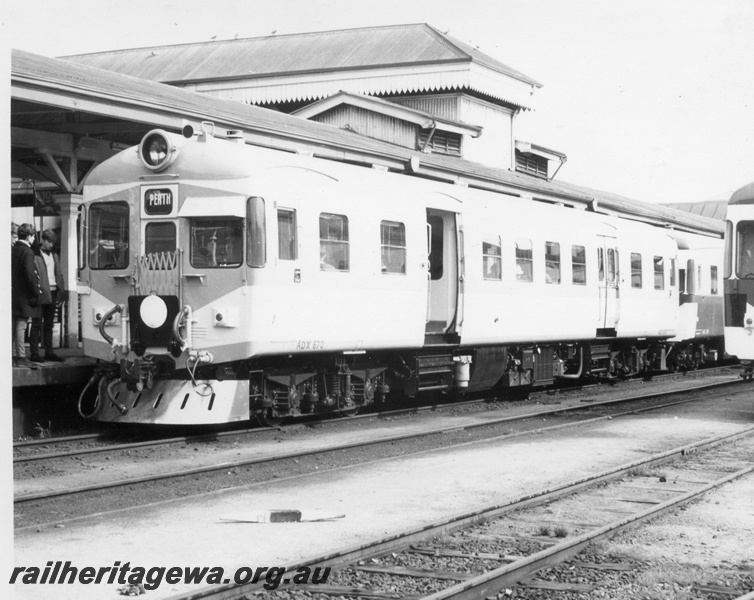 P17797
ADX class 670, standing at platform, station building and canopy, front and side view c1966
