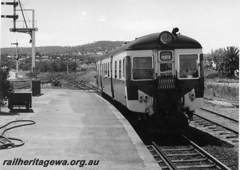 P17802
ADG class railcar, on 9:50 am Chidlow to Perth service, arriving at platform, bracket signals, pointwork, Bellevue station, ER line 
