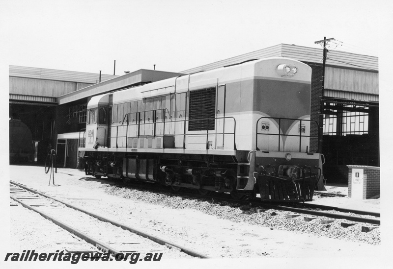 P17839
K class 204 standard gauge diesel locomotive at Avon Yard locomotive depot. ER line. Front and side view of locomotives and partial view of locomotive office and maintenance shed.
