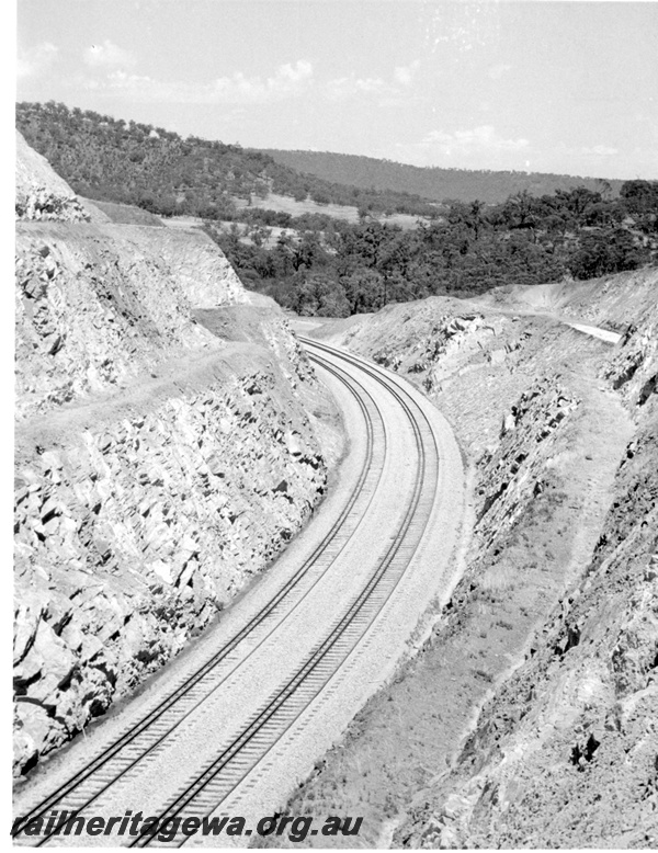 P17857
Windmill Hill cutting east of Toodyay as seen from the top of the cutting. Note the bank shaping process utilised.
