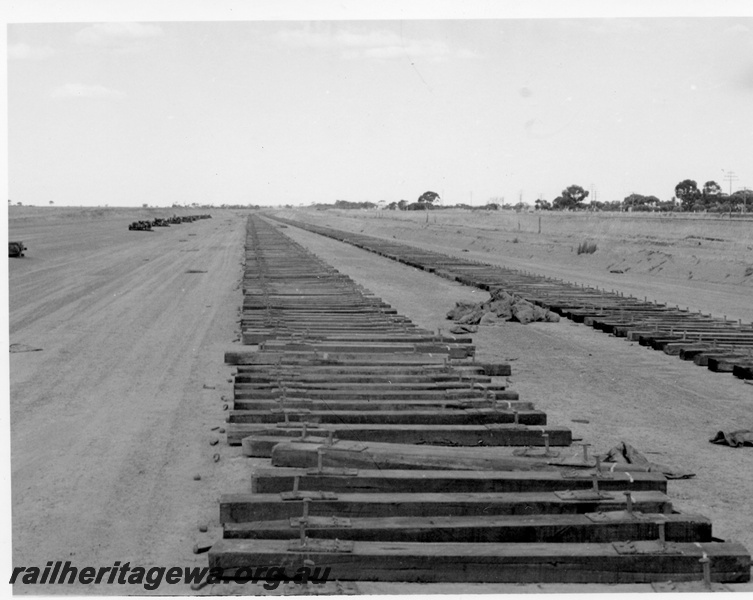 P17861
Doodlakine and the sleepers awaiting the arrival of a construction train with a load of rails so that tracklaying can continue. EGR Line. Doodlakine is 143 miles from Perth.
