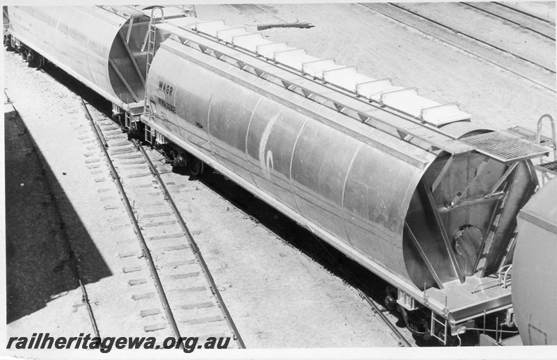 P17888
2 of 3 Midland built aluminium wheat wagons, WWA class 32302, wheat sheaf on side, Leighton, ER line, side and view taken from above
